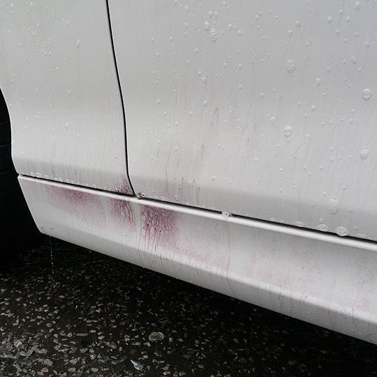 White BMW fallout remover. Bilt Hamber Korrosol. Autoglym Magma. Iron remover. Fallout remover. Wheel cleaner turn purple. Colour changing formula. Autoglym Fallout Remover